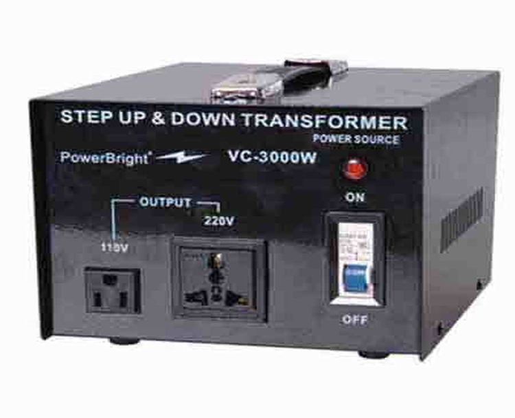 A small, black step up and step down transformer, with a power button and red light to signify power, a 110V output outlet, a 220V, output outlet, and white text that reads: “Step up and down transformer, power source, PowerBright, a horizontal lightning bolt logo, and VC-3000W.”