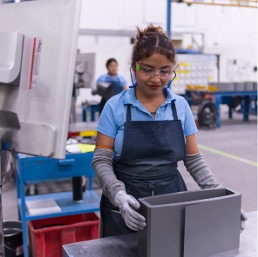 Corefficient team member assembling transformer cores ensuring high-quality production.